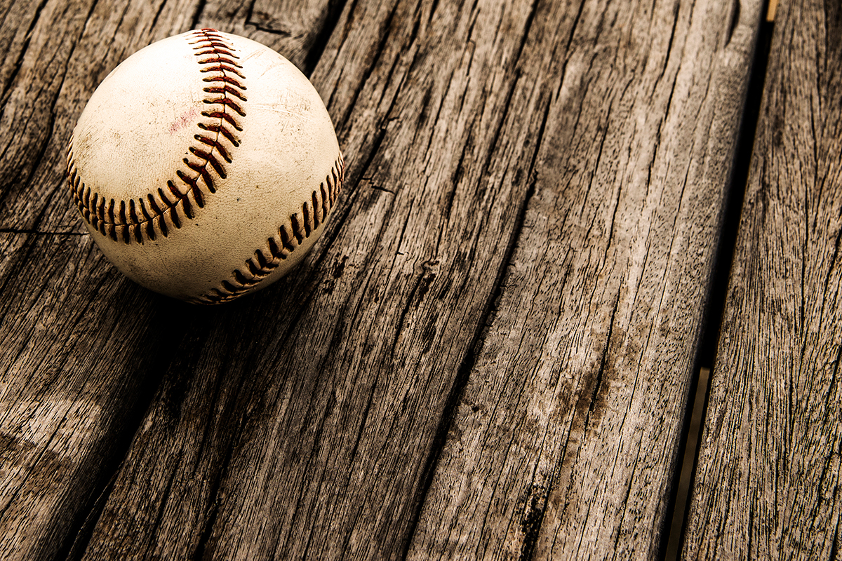 Old Baseball on Wood