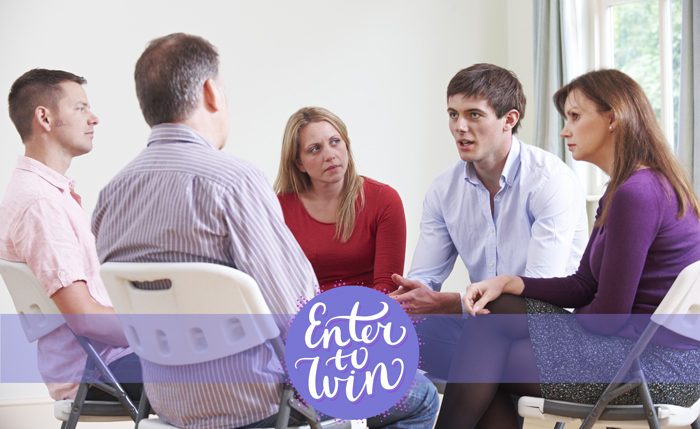 people sitting in a circle during a group therapy session with superimposed text that reads enter to win