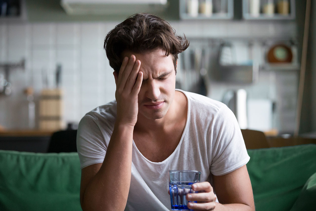 man having a headache