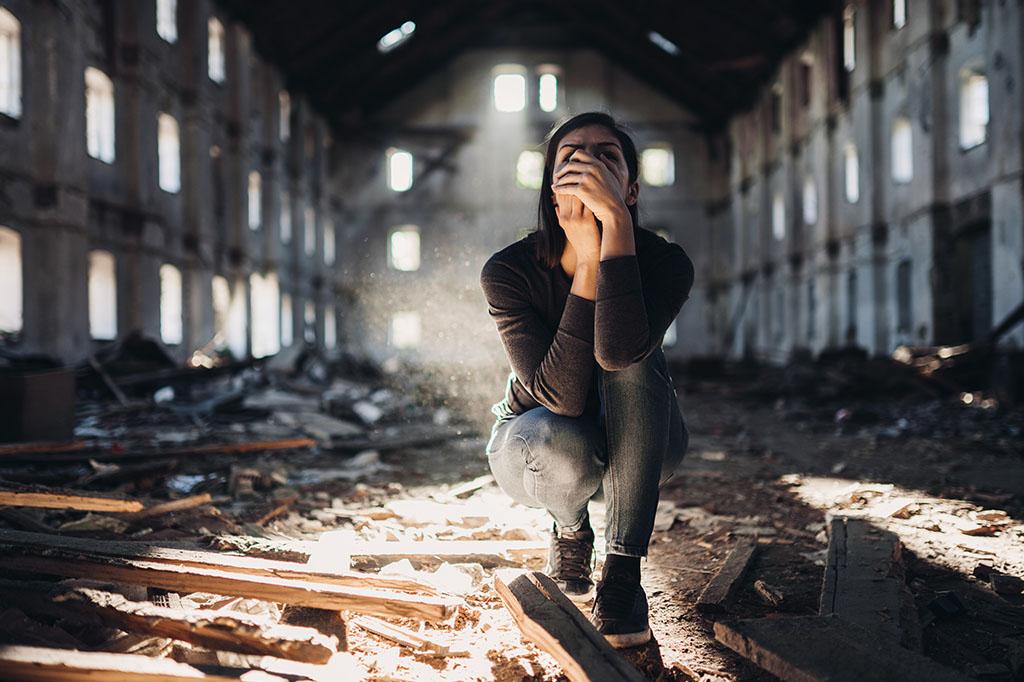 woman in an abandoned place