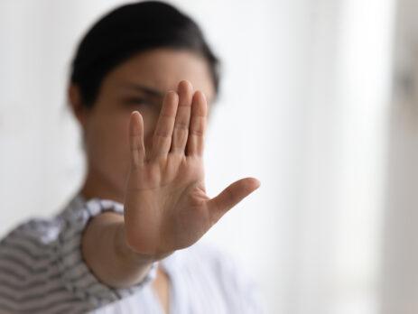 woman raising his palm