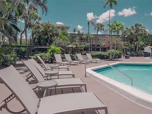 Poolside lounge chairs at the behavioral health treatment facility